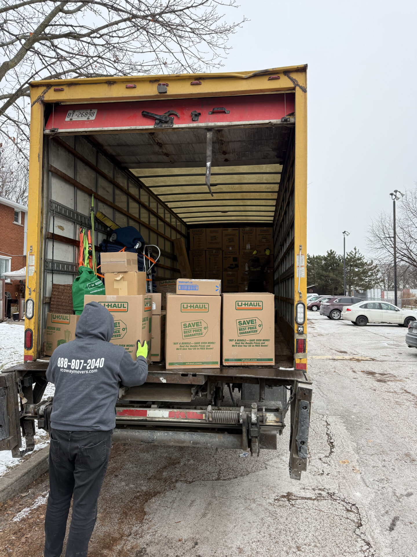 Navigating a high-rise hallway during an office move in Calgary