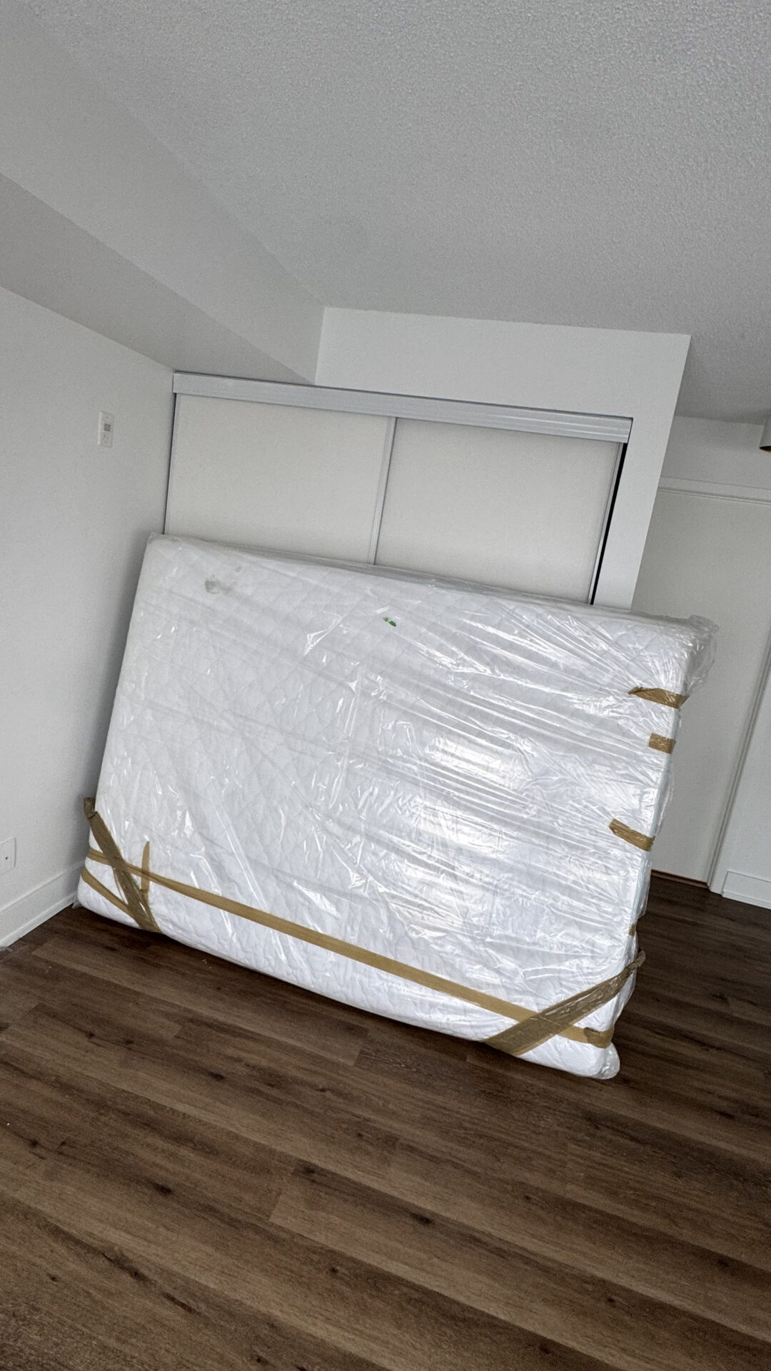 Ecoway Movers Richmond Hill crew using bubble wrap to pack fragile items during a local residential move