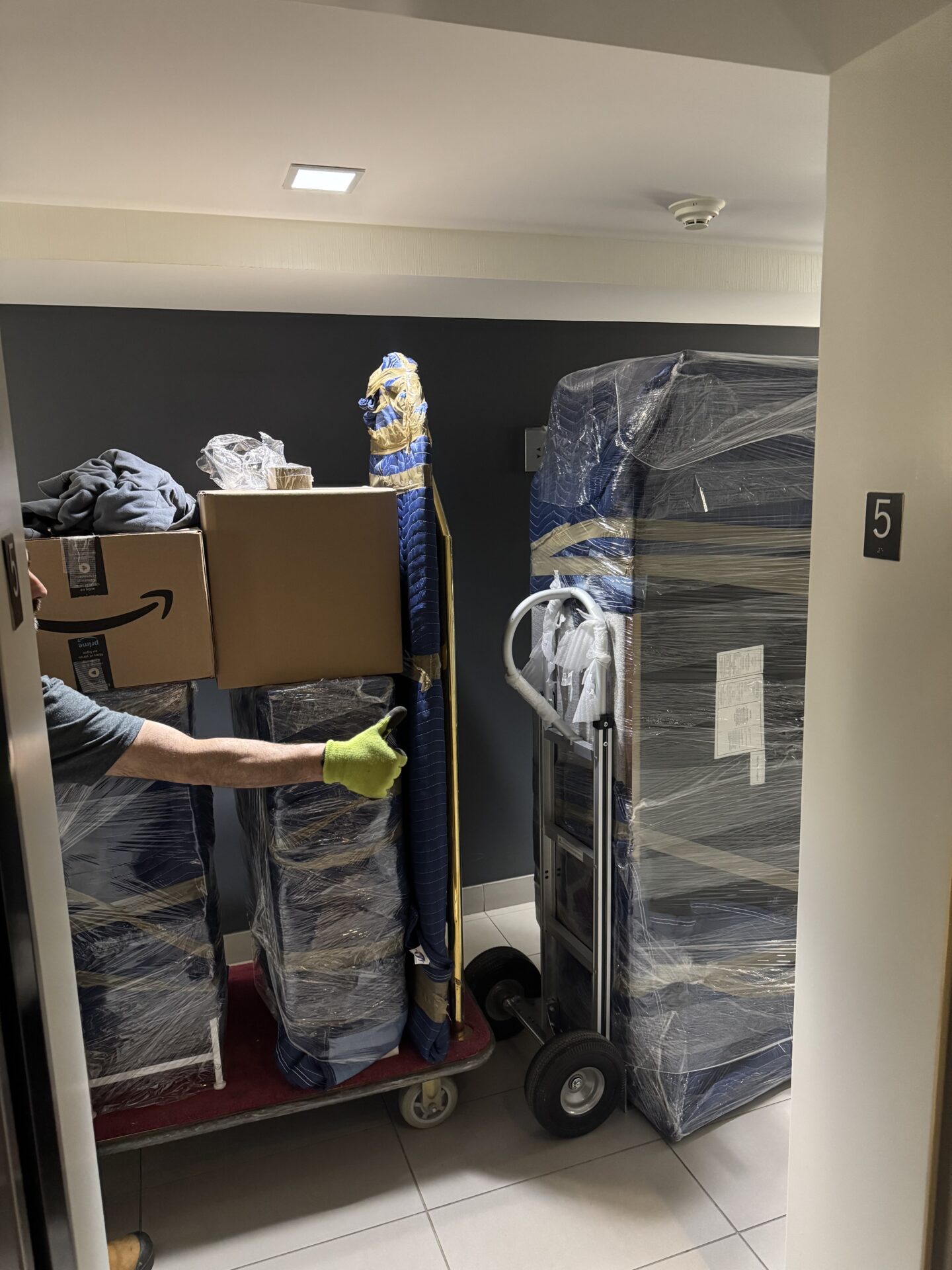 Ecoway Movers using floor protection at a Mississauga home doorway during move