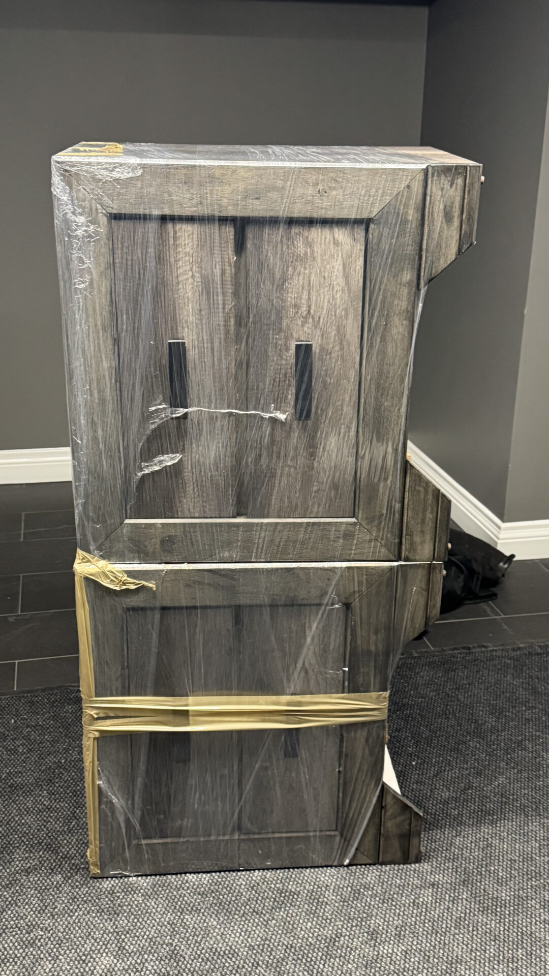 Ecoway Movers professional wrapping and protecting furniture with moving blankets before transport for a Laval home relocation