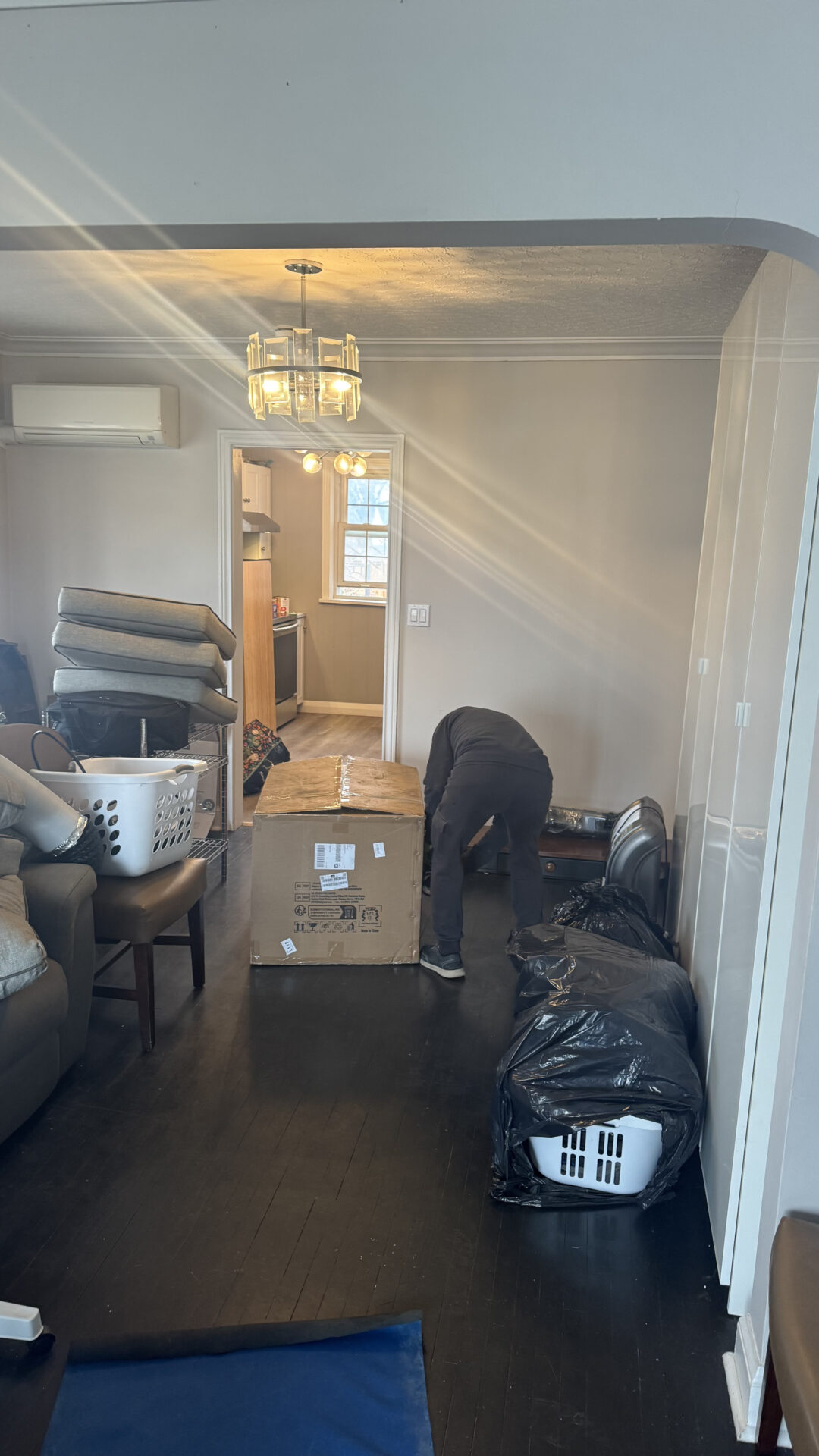 Ecoway Movers Scarborough expert packers packing and systematically labeling boxes using professional packing materials for a Scarborough home move