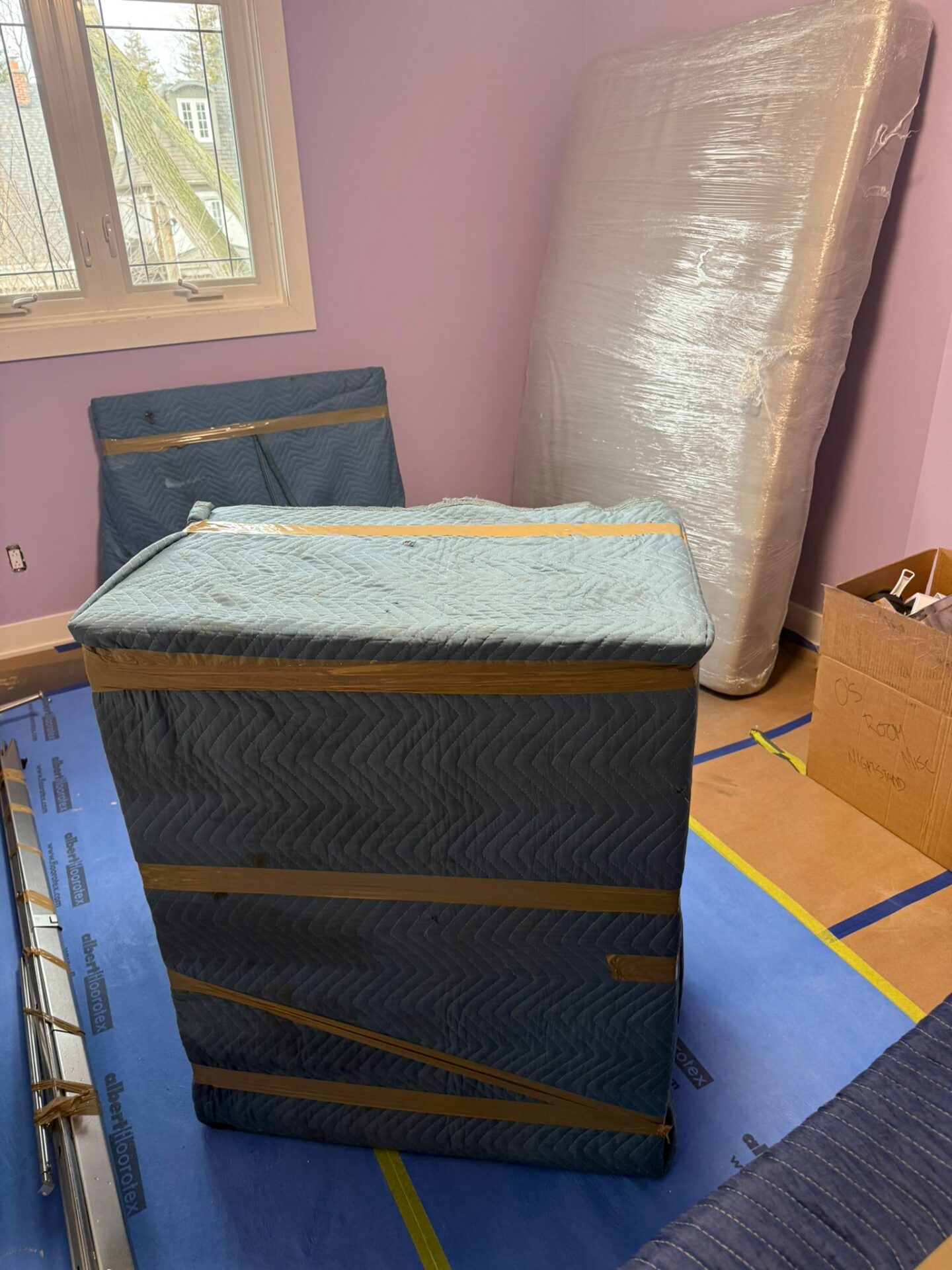 Ecoway Movers Guelph crew with perfectly wrapped and padded furniture ready for safe transport during local Guelph move