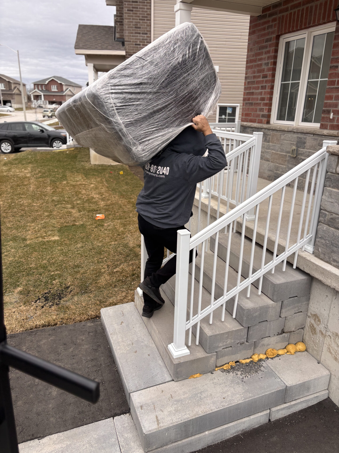 Ecoway Movers Victoria BC professional crew loading furniture into a fully equipped moving truck during a residential relocation in Greater Victoria