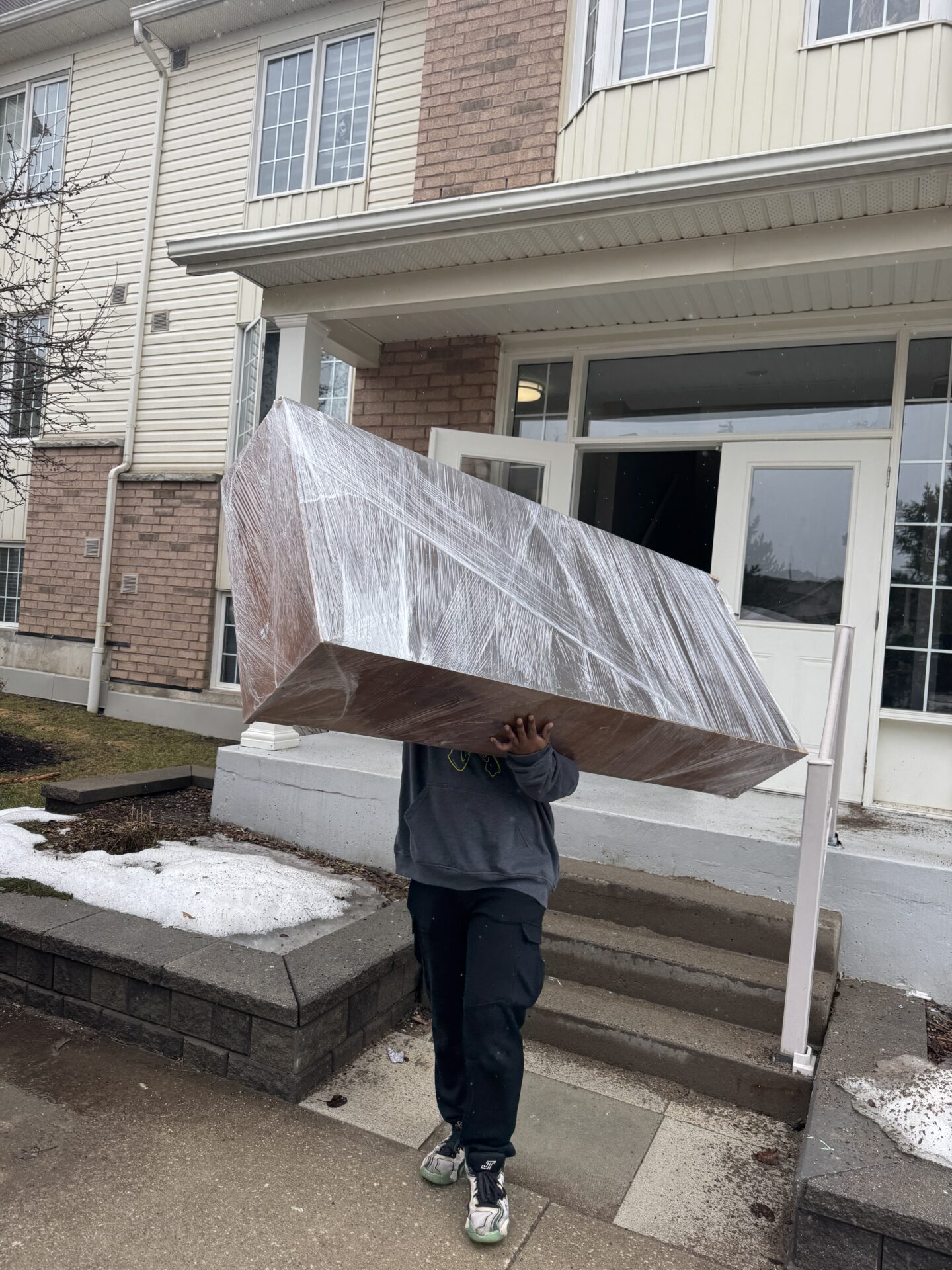 Ecoway Movers Welland professional moving crew preparing to load household goods for a local Welland Ontario residential move