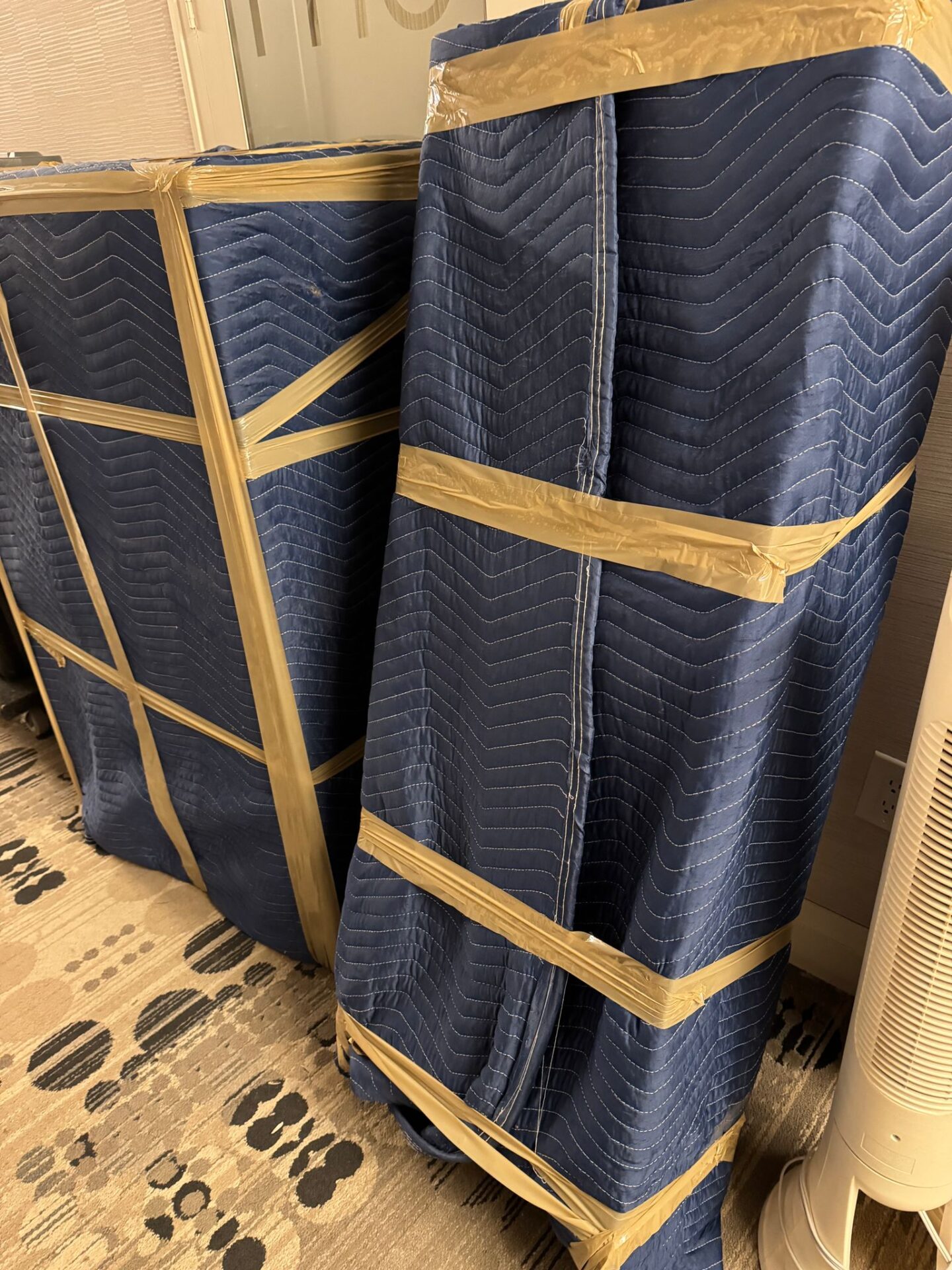 Ecoway Movers Winnipeg MB wardrobe packing and moving service showing professional wardrobe box usage during a Winnipeg apartment move