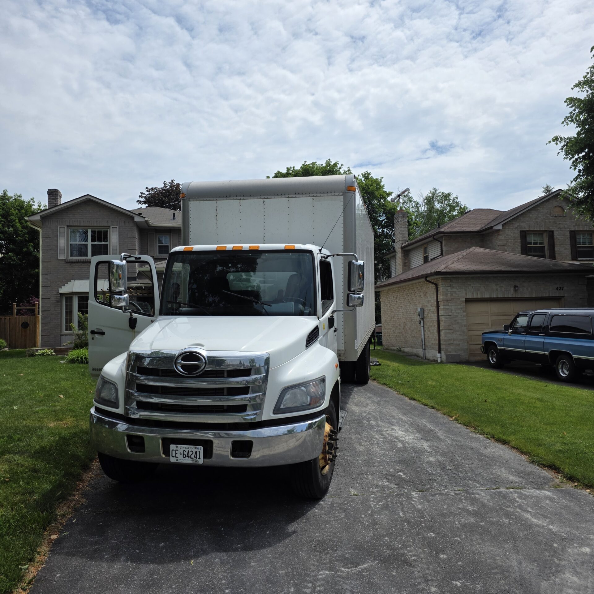 Ecoway Movers certified crew executing two-bedroom apartment relocation in Beechwood with floor protection protocol