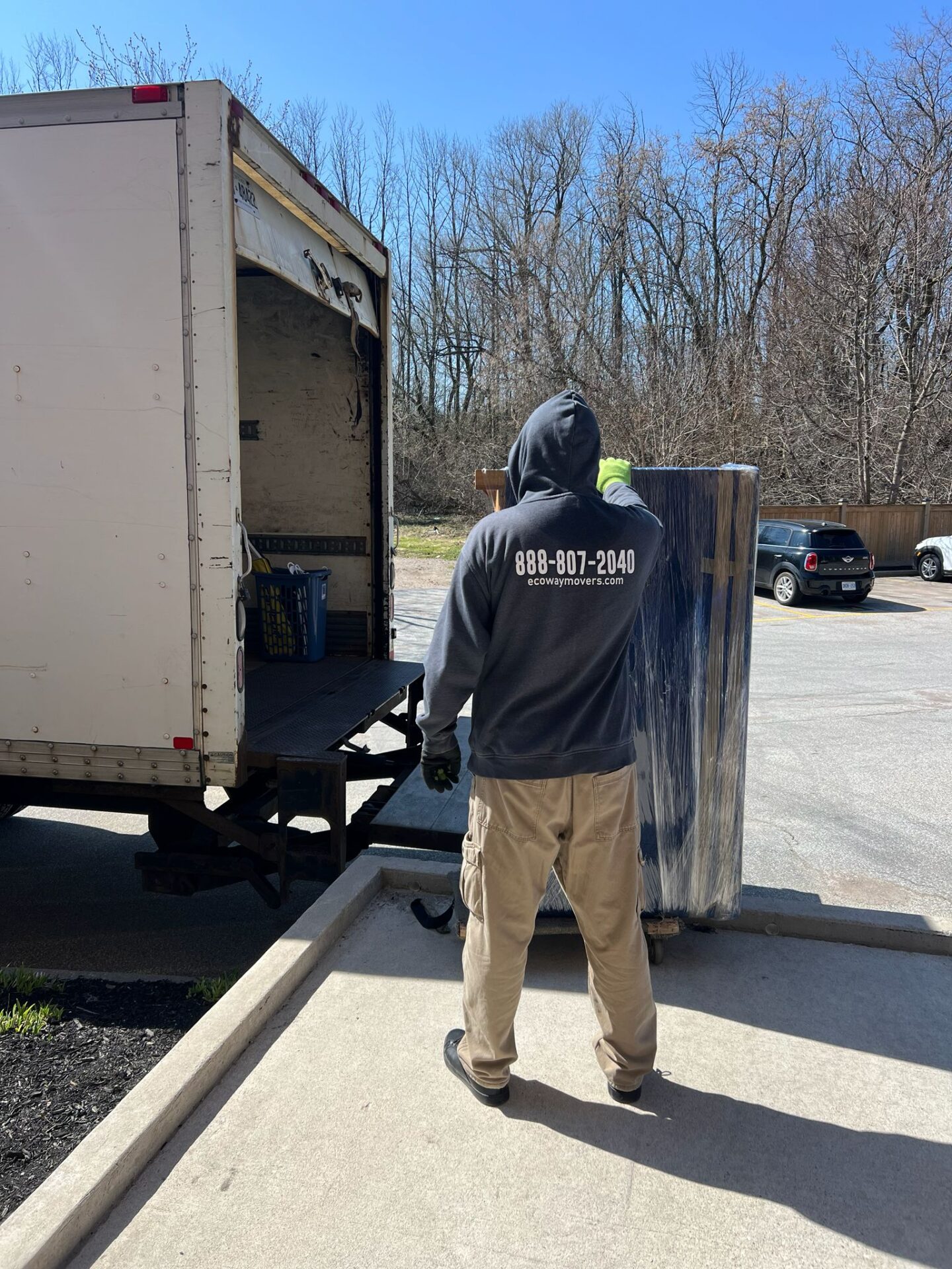 Ecoway Movers certified crew executing relocation in Panorama Hills with floor protection protocol