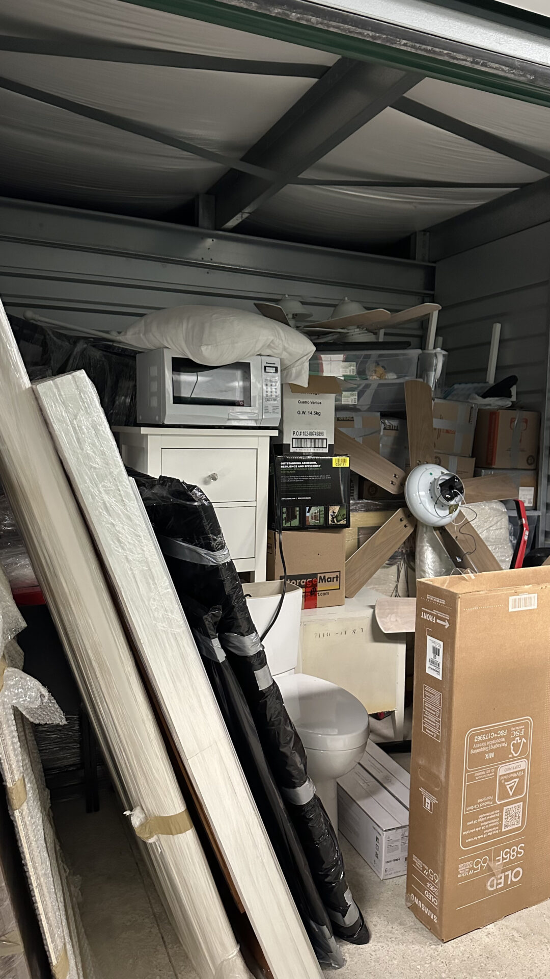 Ecoway Movers crew completing a professional residential move in Albion Maple Ridge with floor protection and furniture wrapping visible