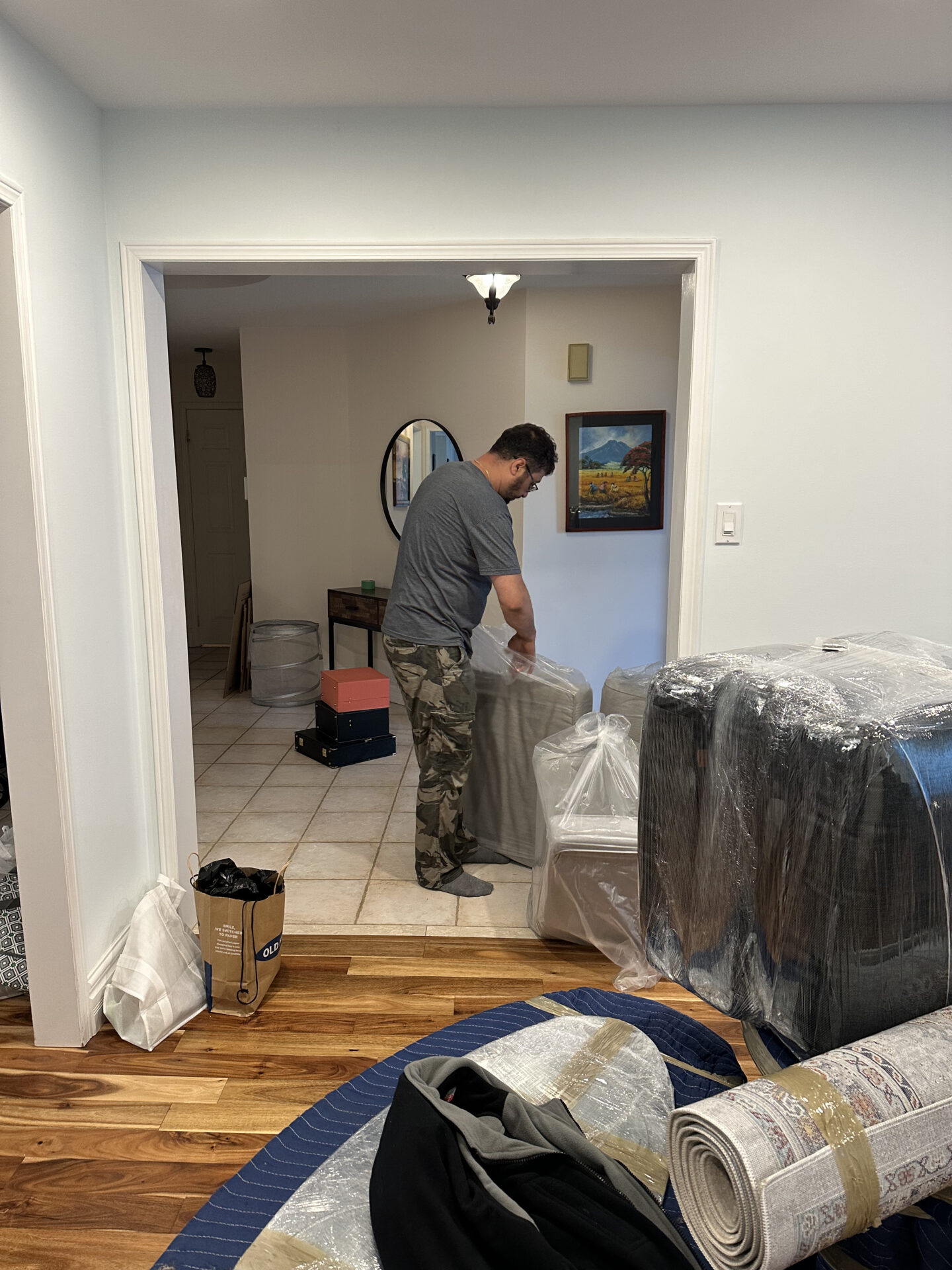 Ecoway Movers crew standing with satisfied Crescentwood homeowner after successful relocation