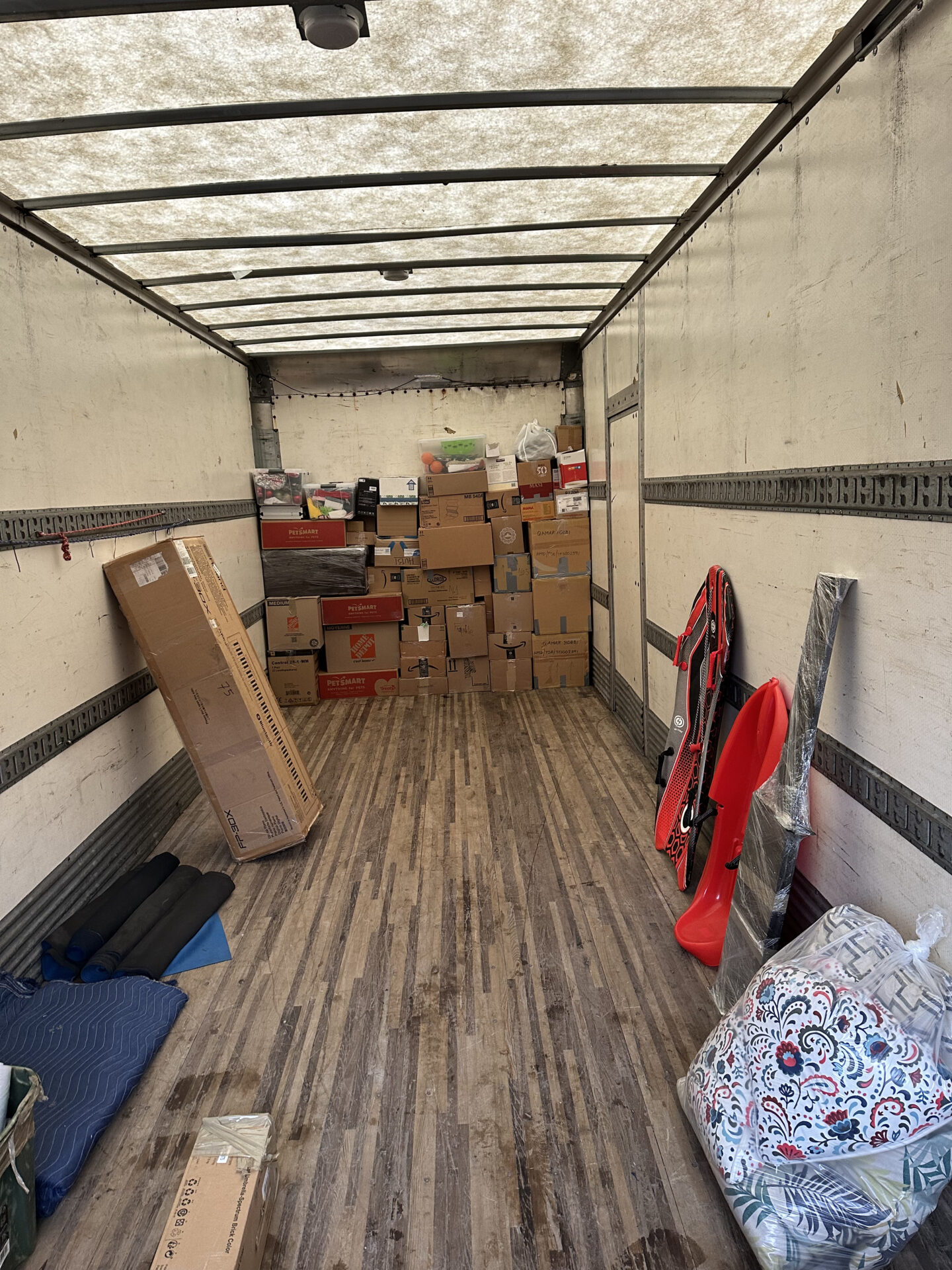 Ecoway Movers certified crew executing two-bedroom apartment relocation in Crescentwood with floor protection protocol