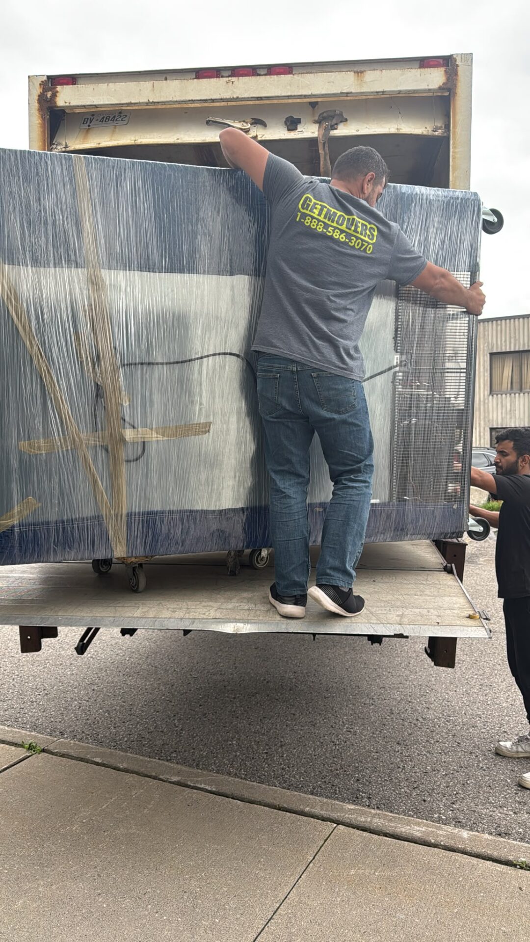 Get Movers Brampton ON 5-ton commercial vehicle safely navigating mature tree-lined subdivision in Peel Village