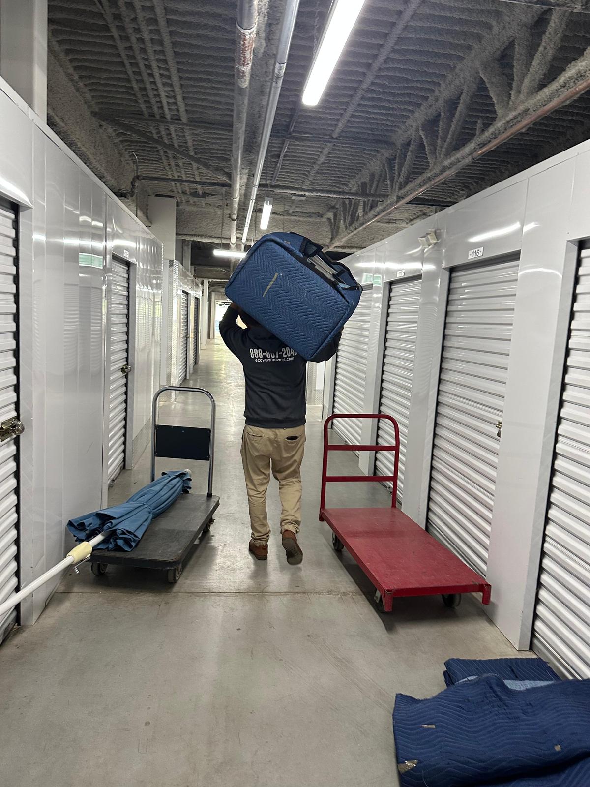 Ecoway Movers wrapping furniture with blankets