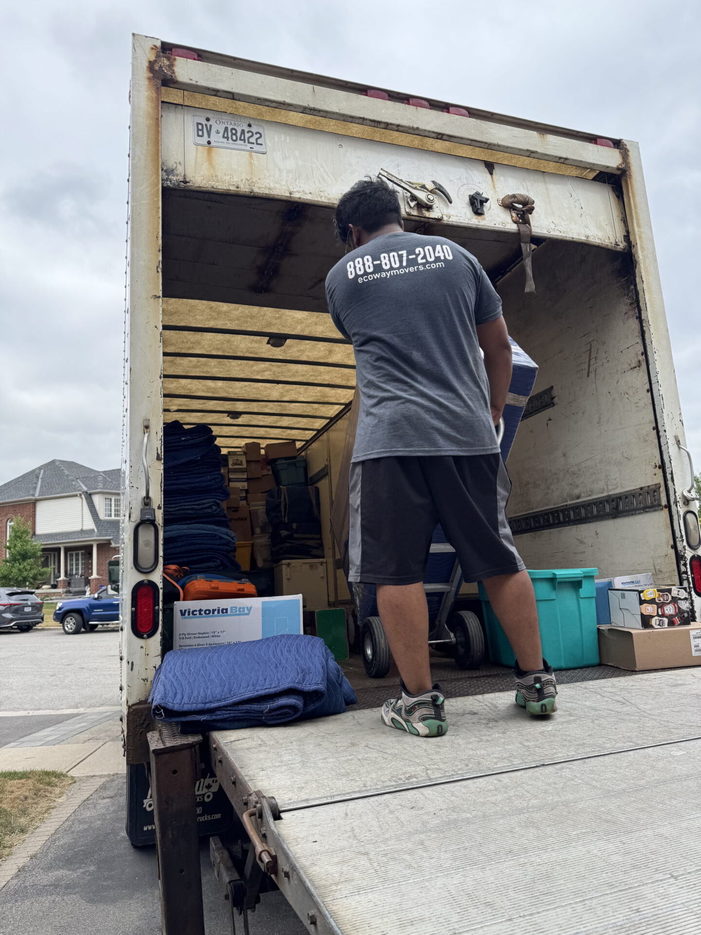 Ecoway Movers fully equipped moving truck staged at Collingwood residential property for local moving services in the Georgian Bay area
